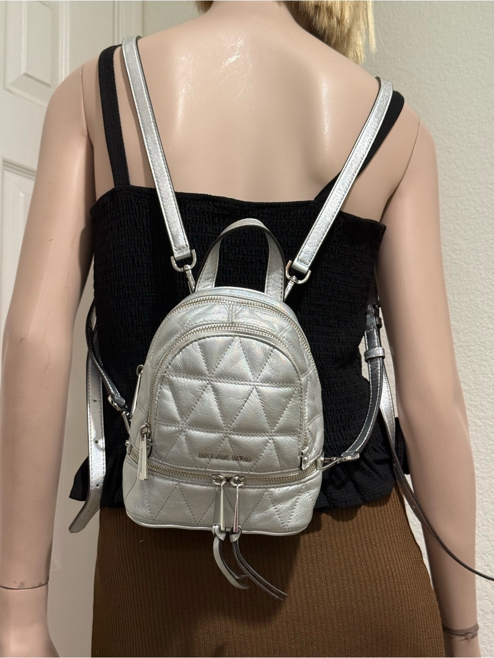 MICHAEL KORS Rhea Mini Silver Metallic Quilted Leather Mini Backpack
EUC - Picture 4 of 16